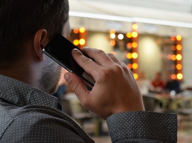 man talking on phone