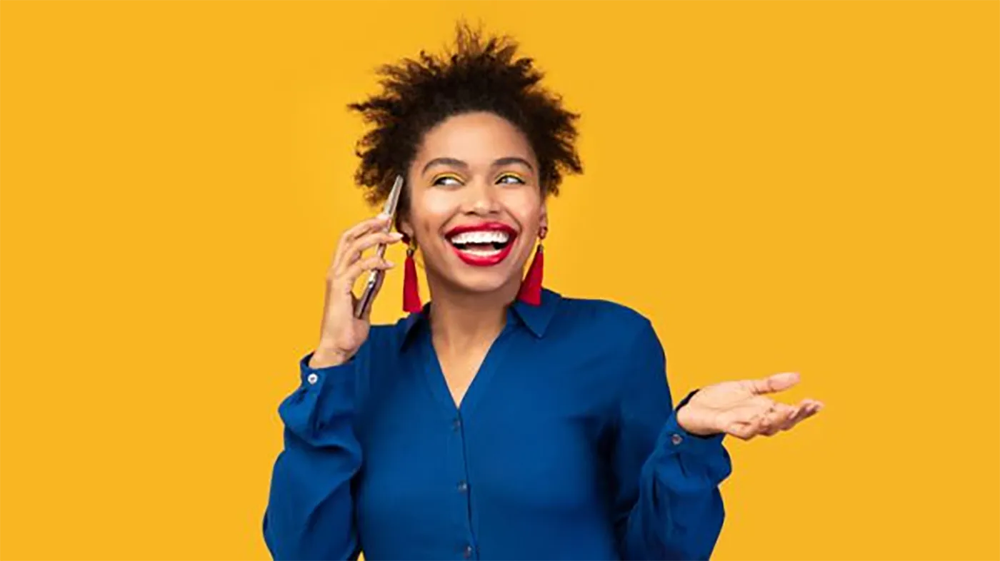 Happy woman talking on phone