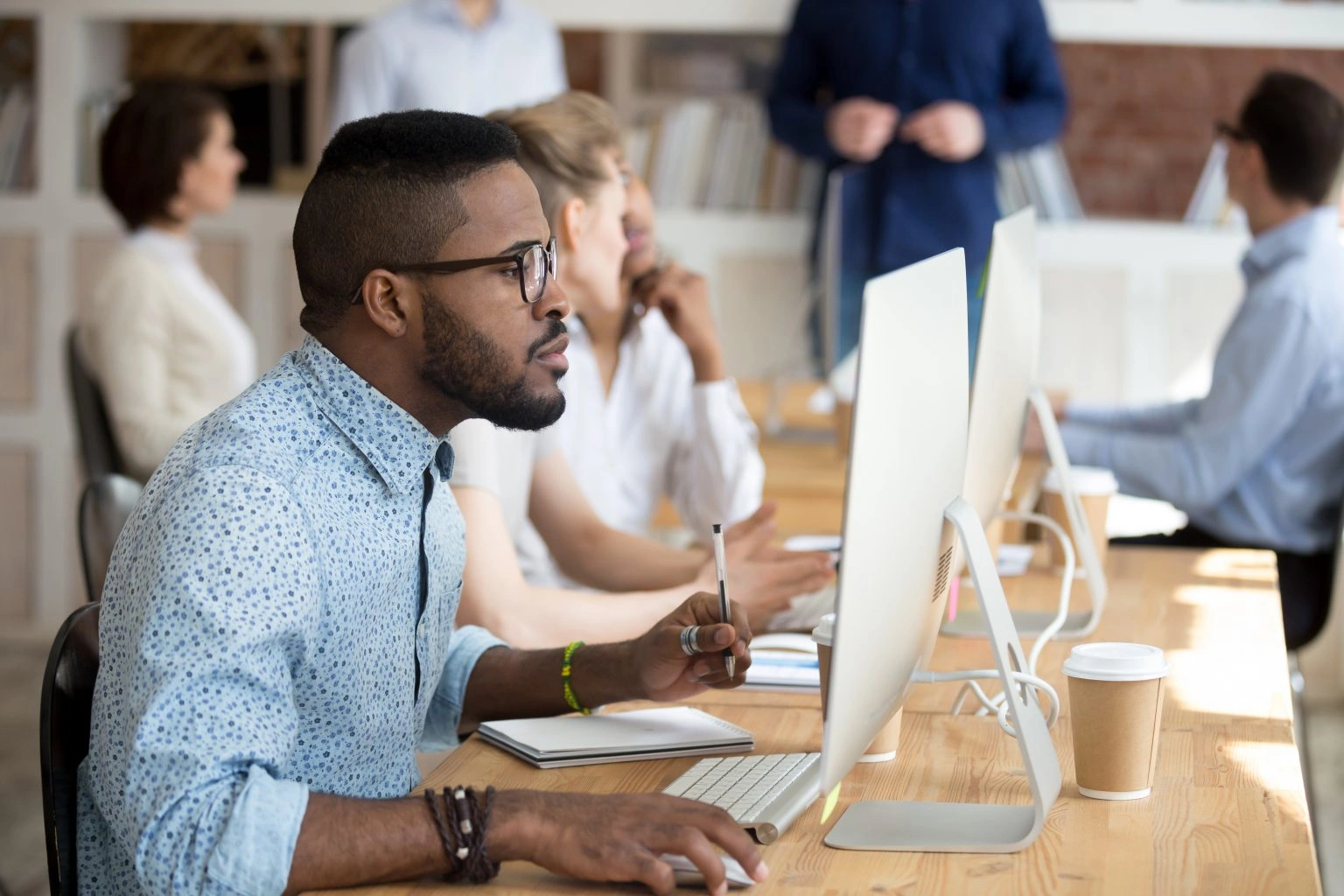 man working at computer