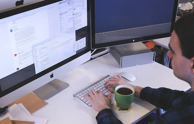 man working on computer