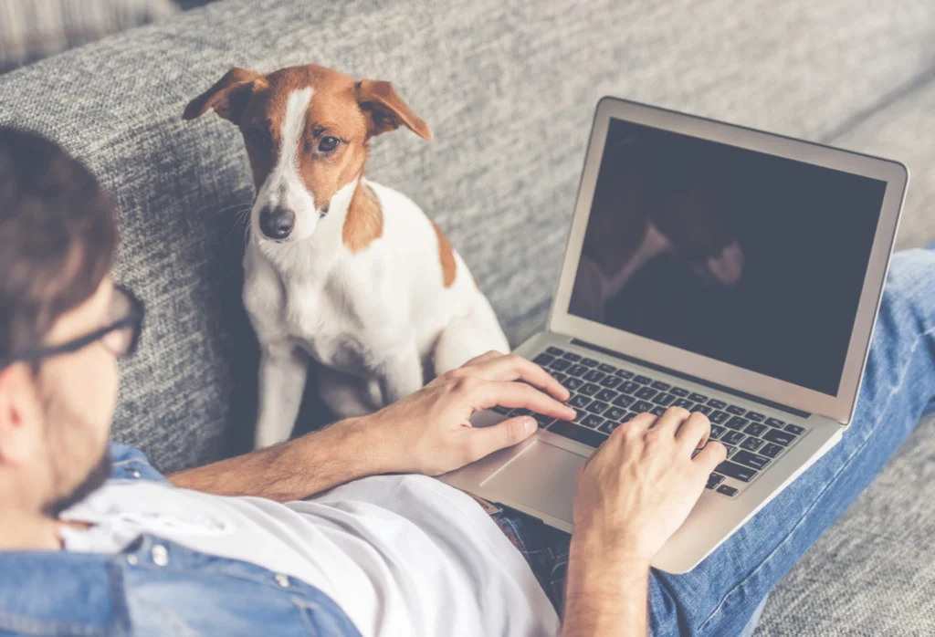 man working from home on laptop