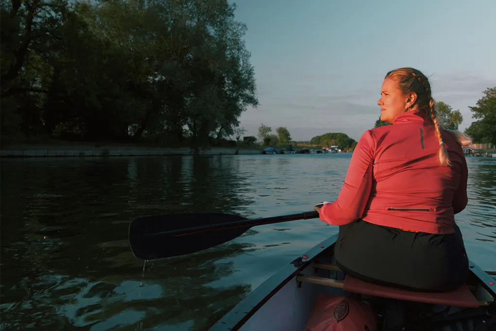 woman in canoe on a lake