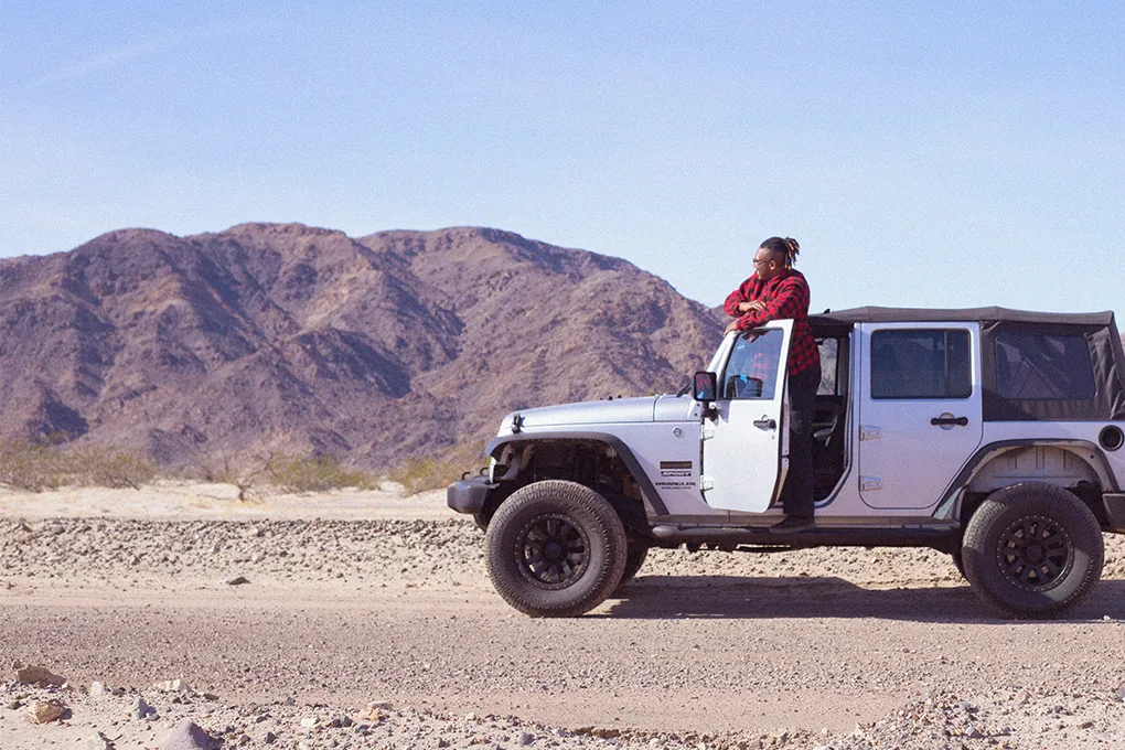 man in jeep