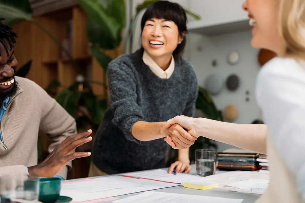 two people shaking hands