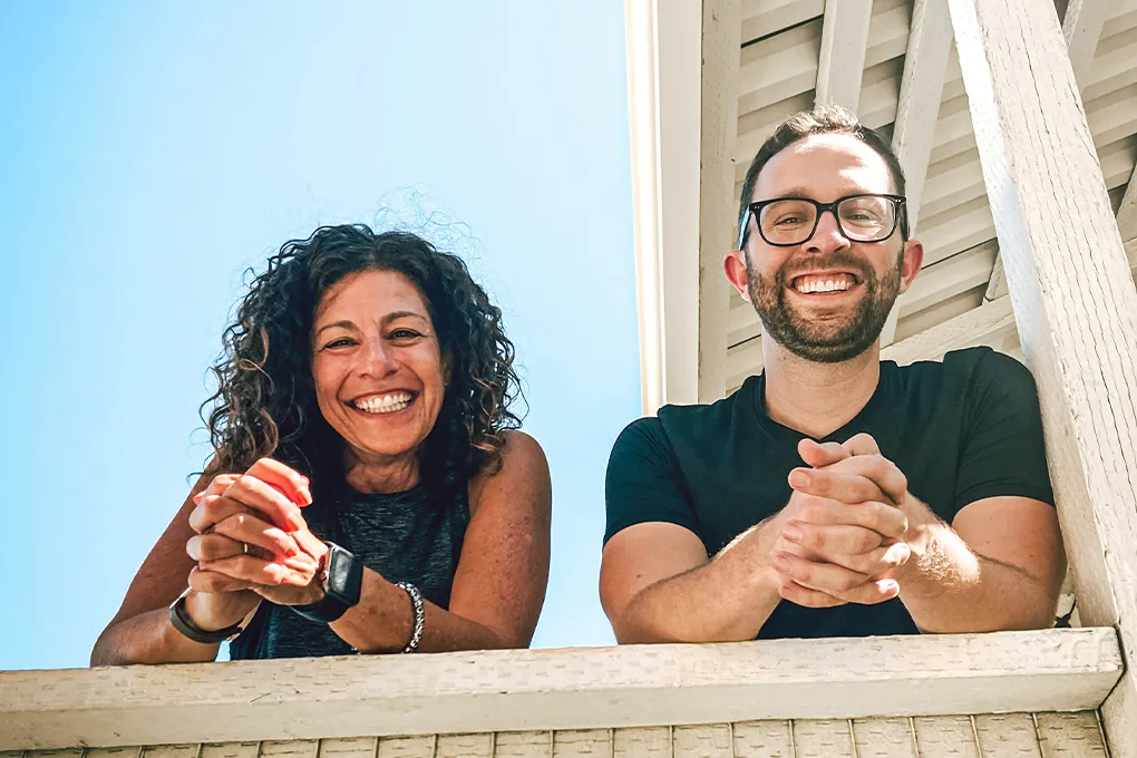 two people smiling